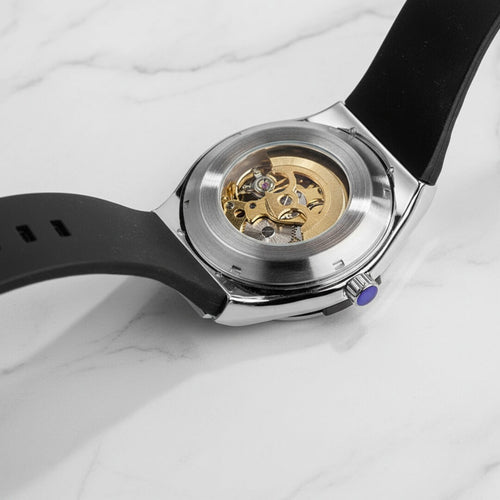 Detailed Shot Of skeleton dial - grandmaster automatic watch by Dnaiel Steiger