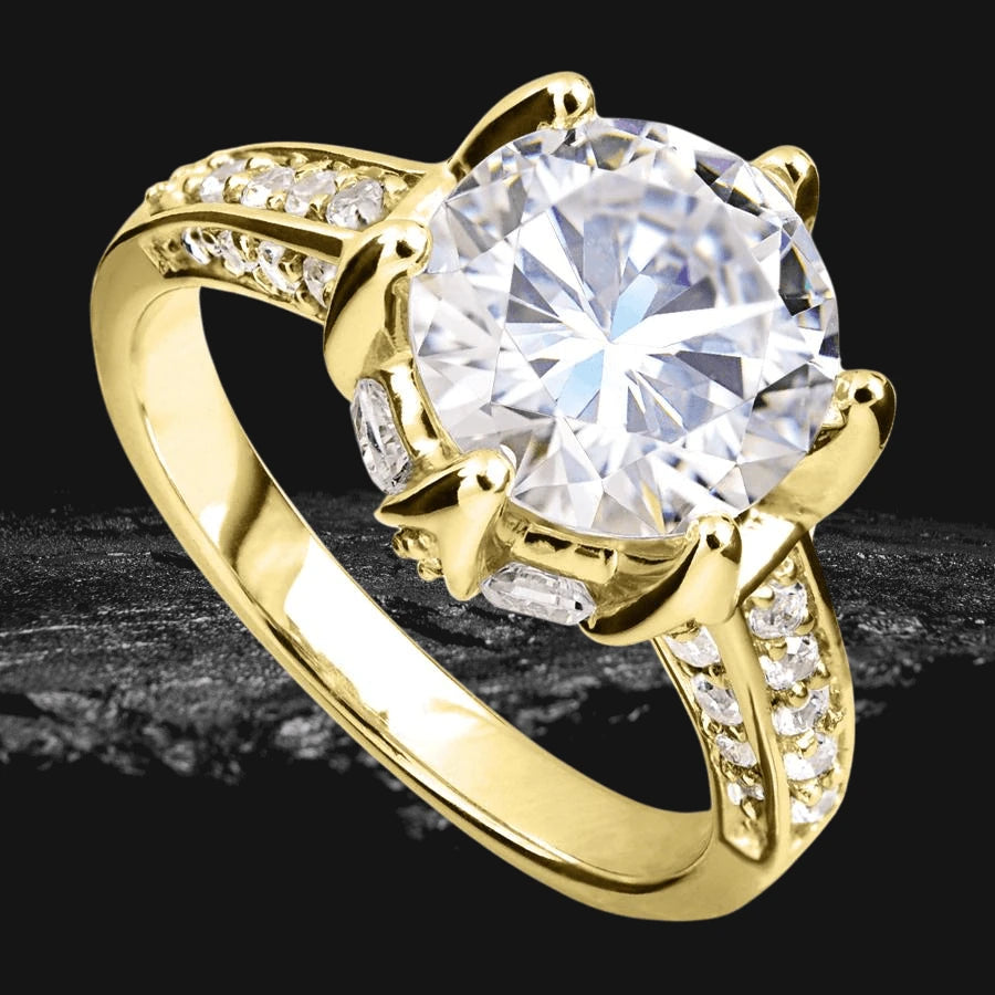 Gold Lotus Ring featuring a large round clear gemstone set in gold-plated sterling silver with smaller sparkling stones along the band, designed for women.