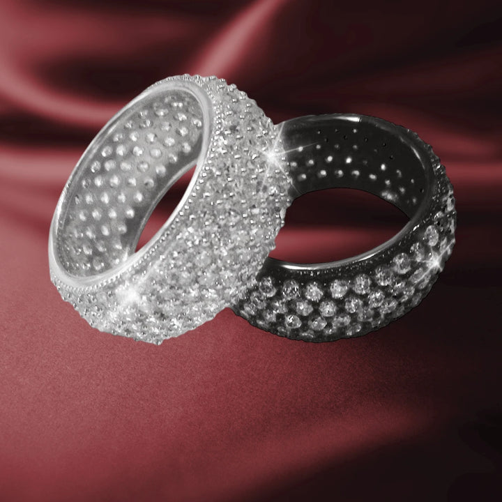 Dash White Rhodium Ring in sterling silver with rhodium plating for women, featuring a sparkling textured design that catches the light beautifully on a dark red background.
