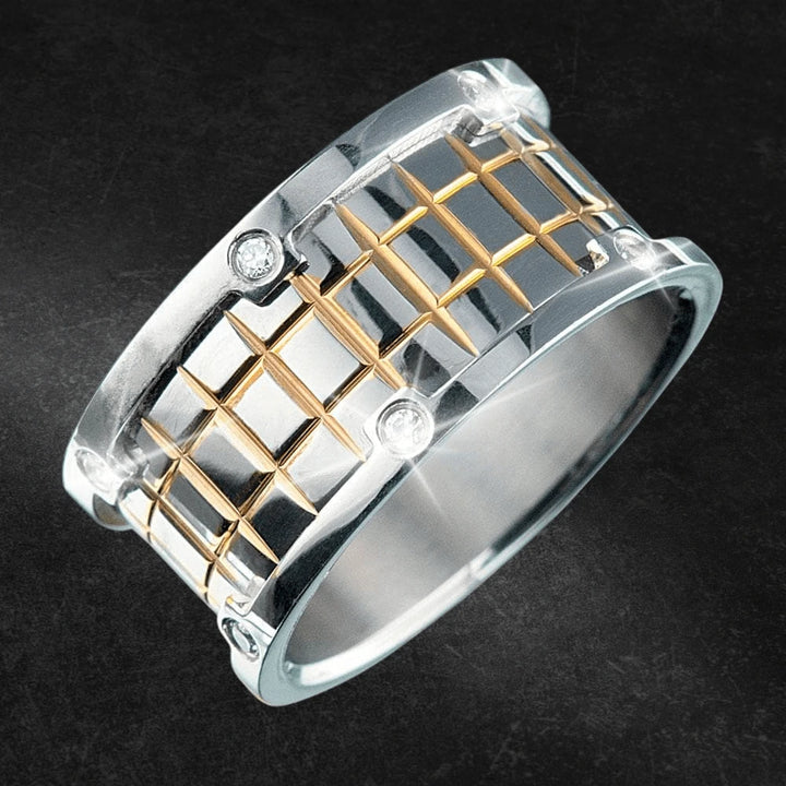 Men's Endeavor Ring featuring a two-tone plating design with stainless steel material and intricate gold grid pattern accented by small sparkling stones.