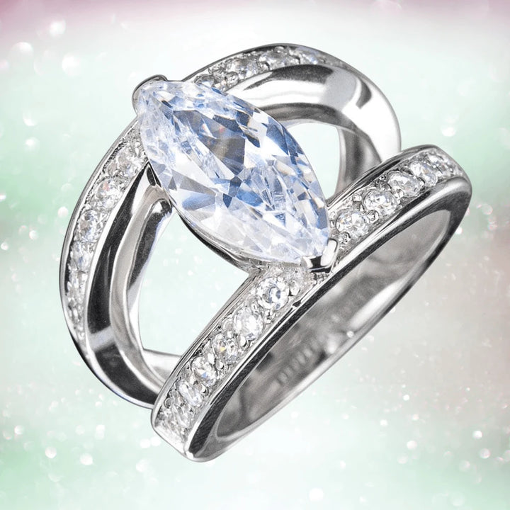 Marquise Strata Ring featuring a marquise-cut clear gemstone set in sterling silver with pavé-set accent stones on an elegant, split shank band for women’s fine jewelry.