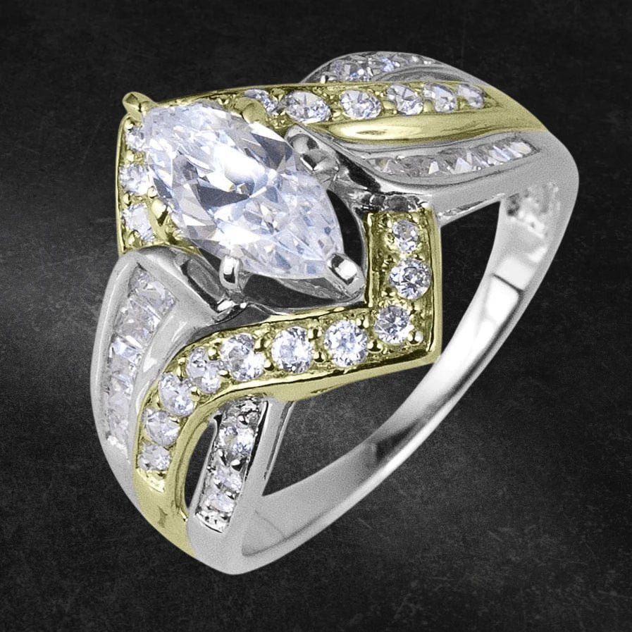 Venus Ring featuring a two-tone sterling silver design with a marquise-cut center stone and multiple smaller stones accentuating the elegant jewelry piece for female wear.