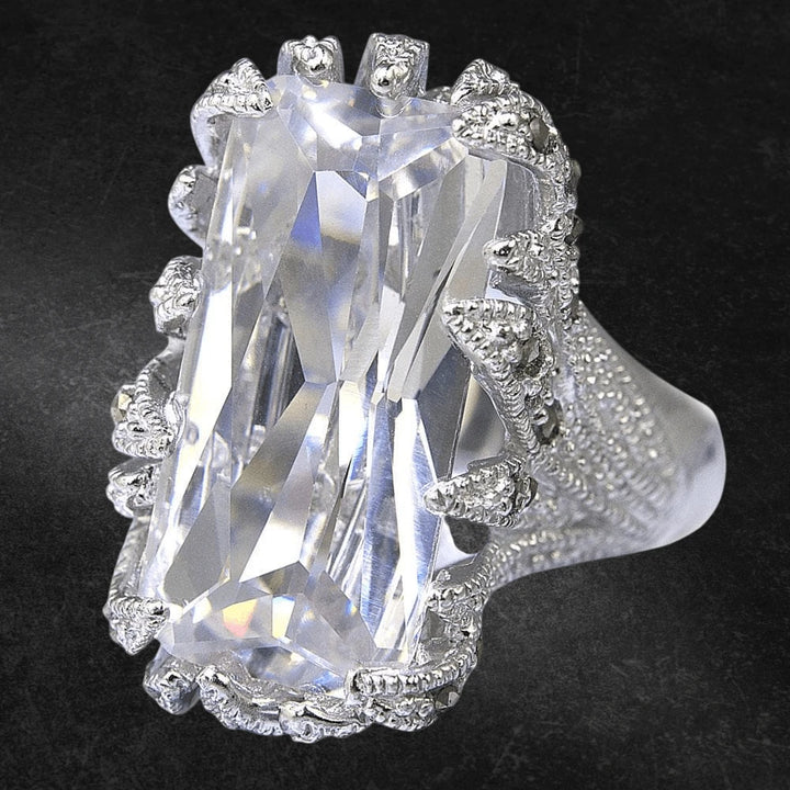 Wild Thorn Rhodium Ring featuring a large rectangular clear gemstone set in sterling silver with intricate rhodium-plated detailing, designed for female jewelry lovers.