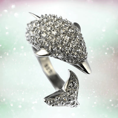 Dolphin Ring crafted from sterling silver with rhodium plating, featuring a detailed dolphin design encrusted with sparkling stones, designed for female jewelry lovers.