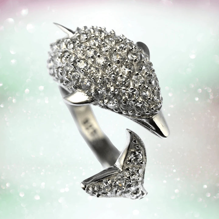 Dolphin Ring crafted from sterling silver with rhodium plating, featuring a detailed dolphin design encrusted with sparkling stones, designed for female jewelry lovers.