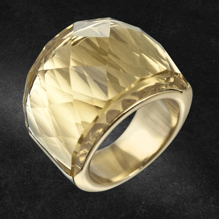 Yellow Crystal Kaleidoscope Ring featuring a large faceted yellow crystal set in stainless steel with gold plating, designed for women seeking elegant jewelry.