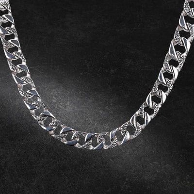 Anaconda Men's Textured Necklace crafted from stainless steel, featuring a bold, interlinked chain design that combines polished and textured surfaces for a striking men's jewelry statement.