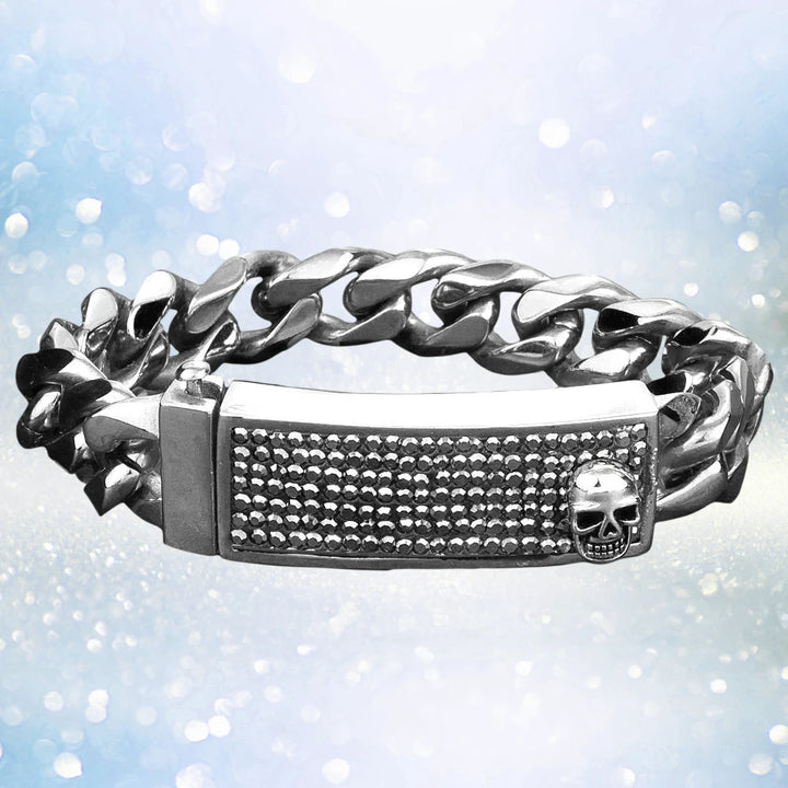 Crystal Skull Bracelet for men featuring a stainless steel chain and a detailed rectangular plate adorned with textured studs and a small skull embellishment.