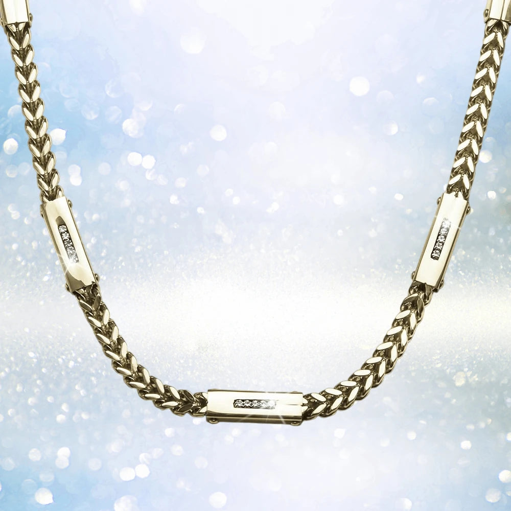 Quadrant Steel Necklace in gold-plated stainless steel for men, featuring a sleek chain design with three embedded sparkling accents against a shimmering background.