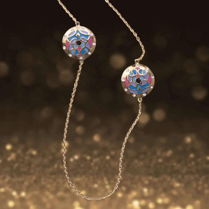 Golden Peacock Necklace featuring gold-plated stainless steel with vibrant blue and pink enamel peacock design on a delicate chain, elegant jewelry for female wearers.