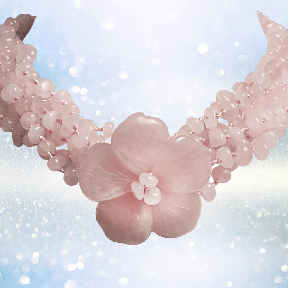 Delicate Cherry Blossom Necklace crafted with pink gems, featuring an intricate floral centerpiece and elegant multi-strand design for a refined female jewelry statement.