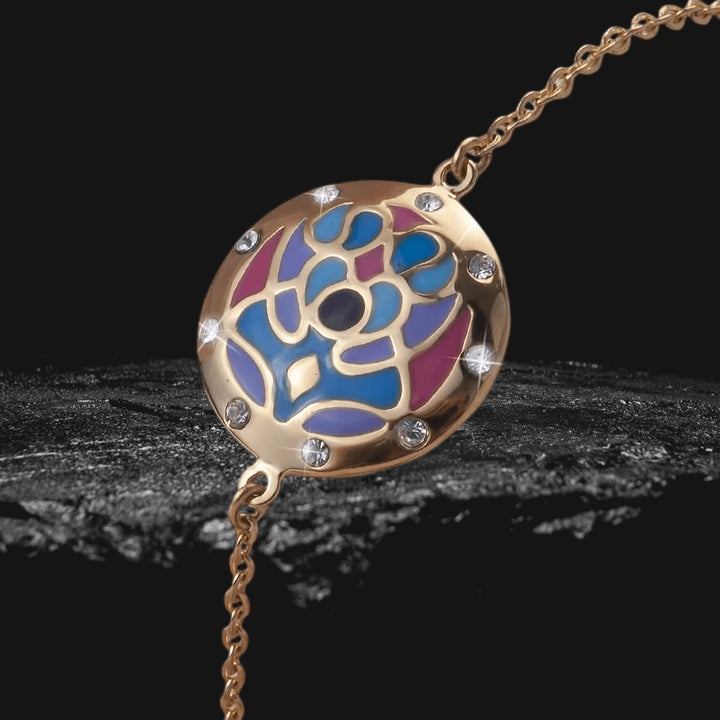 Golden Peacock Bracelet featuring a gold-plated stainless steel design with colorful peacock-inspired enamel and sparkling crystal accents for women’s elegant jewelry.