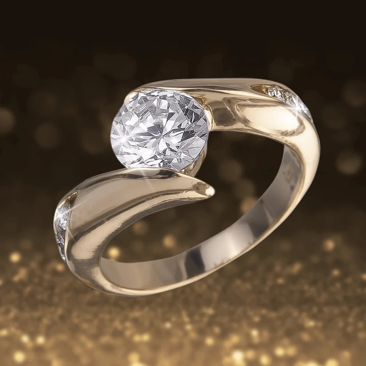 Elegant Viva Gold Rings featuring a sparkling central gemstone set in sterling silver with gold plating, designed for women seeking sophisticated jewelry.
