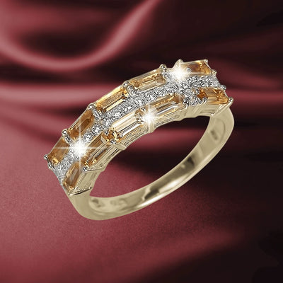 Citrine Star Cross Ring featuring sparkling citrine stones and sterling silver with gold plating, designed for women, set against a rich burgundy background.