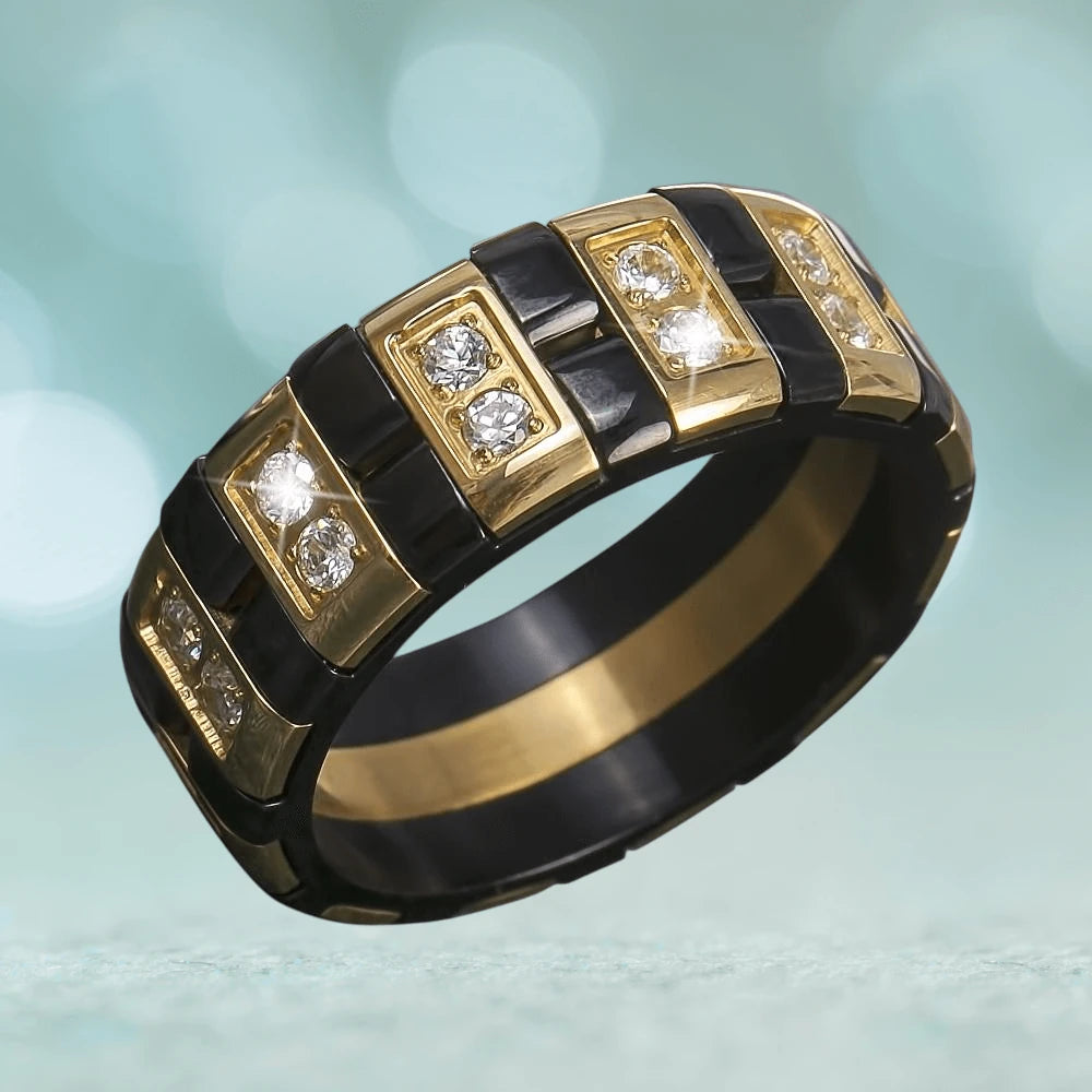 Trident Men's Ring crafted from stainless steel with gold plating, featuring alternating black and gold sections adorned with clear gemstones for a bold and stylish jewelry piece.