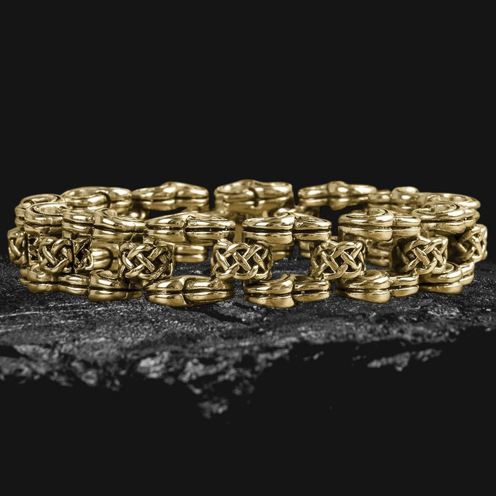 Men's Celtic Knot Gold Bracelet made of stainless steel with intricate Celtic knot design and gold plating, showcasing bold masculine jewelry craftsmanship.