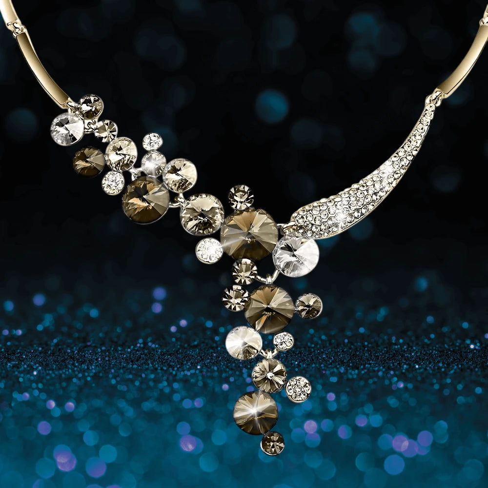 Azalia Coffee Necklace featuring sparkling crystals in varying sizes on a stainless steel chain designed for women, elegant jewelry perfect for special occasions.