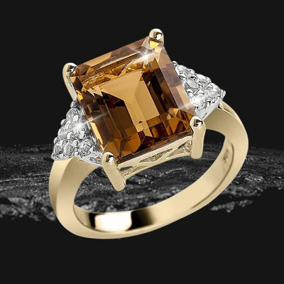 Honey Dew Ring featuring a large rectangular gemstone set in gold-plated sterling silver with intricate detailing, designed for women’s elegant jewelry collections.