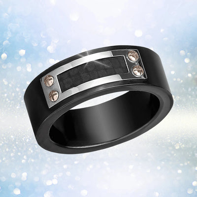 Dynamo Men's Ring in IP Black stainless steel featuring a textured rectangular inlay secured by four screws, showcasing a modern and masculine design for men’s jewelry.