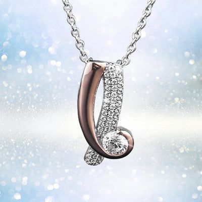 Emelia Pendant featuring a two-tone sterling silver design with sparkling crystals on a delicate chain, capturing elegant jewelry style for women.
