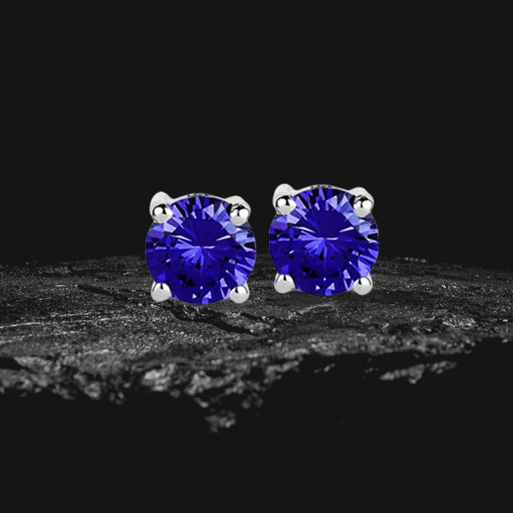 Brilliant Birthstones Earrings September featuring deep blue gemstones set in sterling silver with rhodium plating, designed for women’s fine jewelry collections.