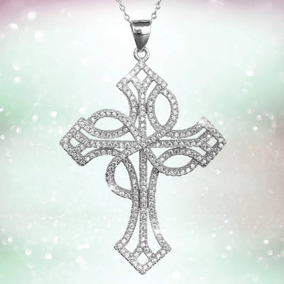 Eulalia Rhodium Cross pendant for females crafted from sterling silver with rhodium plating, featuring intricate openwork and sparkling detail on a delicate chain.