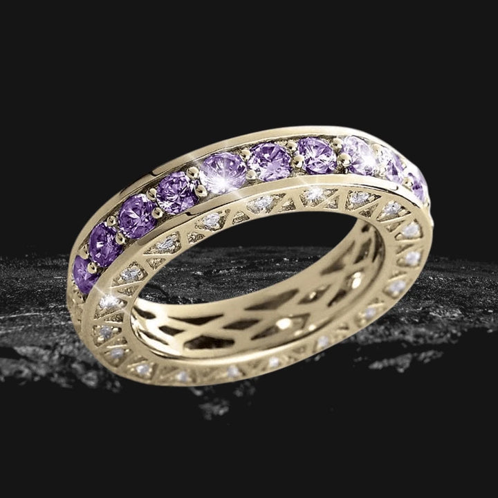 Portofino Amethyst Eternity Ring crafted in sterling silver with gold plating, featuring a continuous row of amethyst gemstones, designed for women’s jewelry collections.