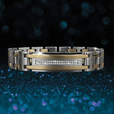 Mitre Two-Tone Bracelet featuring a stainless steel band with gold-tone accents and a central row of sparkling stones, designed for a sophisticated male look.