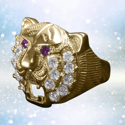 Leon Ring in sterling silver with gold plating, featuring a detailed lion's head design accented with clear stones and purple gemstones for male jewelry enthusiasts.