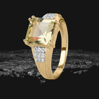 Lemon Quartz Solitaire Ring with a large square lemon quartz stone set in gold-plated sterling silver, accented with sparkling white stones, designed for women.