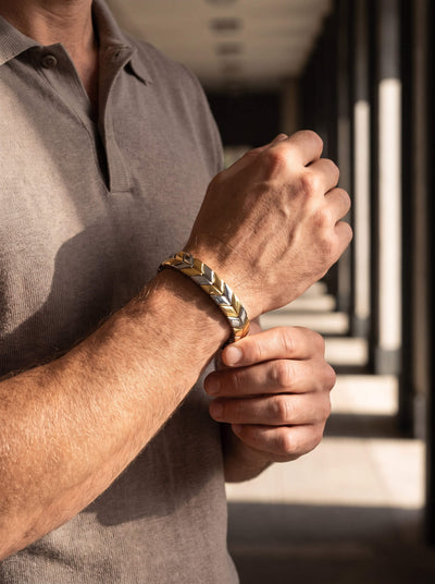 Lorenzo Bracelet on a male wrist showing a polished geometric jewelry design while being adjusted Up To 75% Off Retail