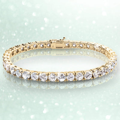 Millionaire Gold Tennis Bracelet featuring sterling silver with gold plating and sparkling clear stones, designed for a refined and elegant female jewelry collection.