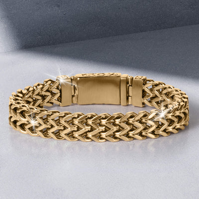 Byzantium Weave Bracelet featuring a polished gold tone interwoven pattern and secure rectangular clasp displayed as elegant statement jewelry