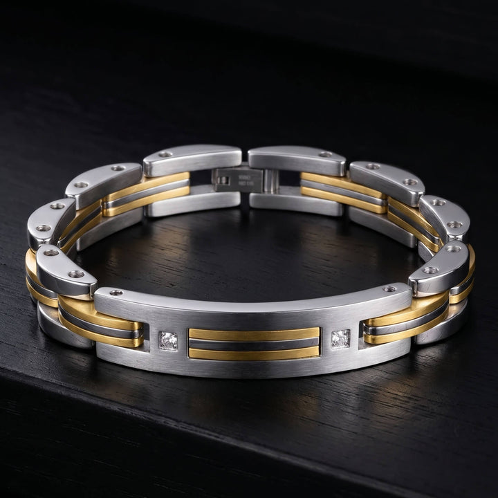 East End Diamond Bracelet featuring a sleek two-tone silver and gold design with embedded diamonds and a modern, polished finish on a dark surface.