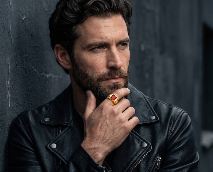 Obsedia Men's Ring worn by a bearded man in a black leather jacket, showcasing its bold red and gold design. Up To 75% Off Retail