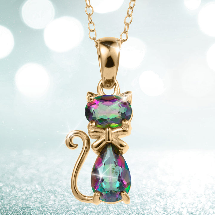 Mystic Kitten Pendant featuring a gold tone cat with vivid iridescent gemstones on a delicate chain against a sparkling background Up To 75% Off Retail
