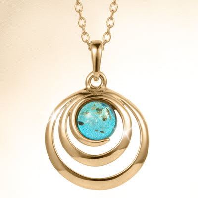 Baltic Lagoon Collection gold tone pendant necklace with a turquoise centerpiece and concentric circular design, Up To 75% Off Retail