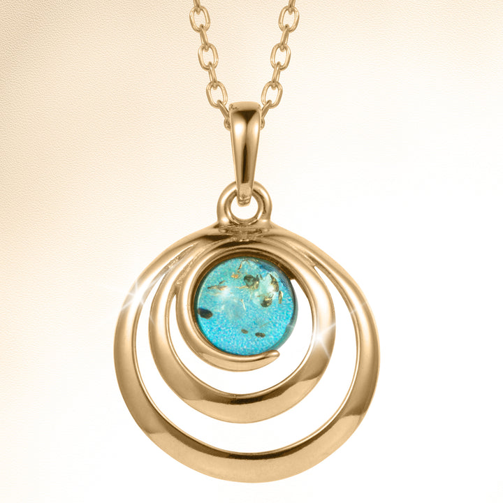 Baltic Lagoon Collection gold tone pendant necklace with a turquoise centerpiece and concentric circular design, Up To 75% Off Retail