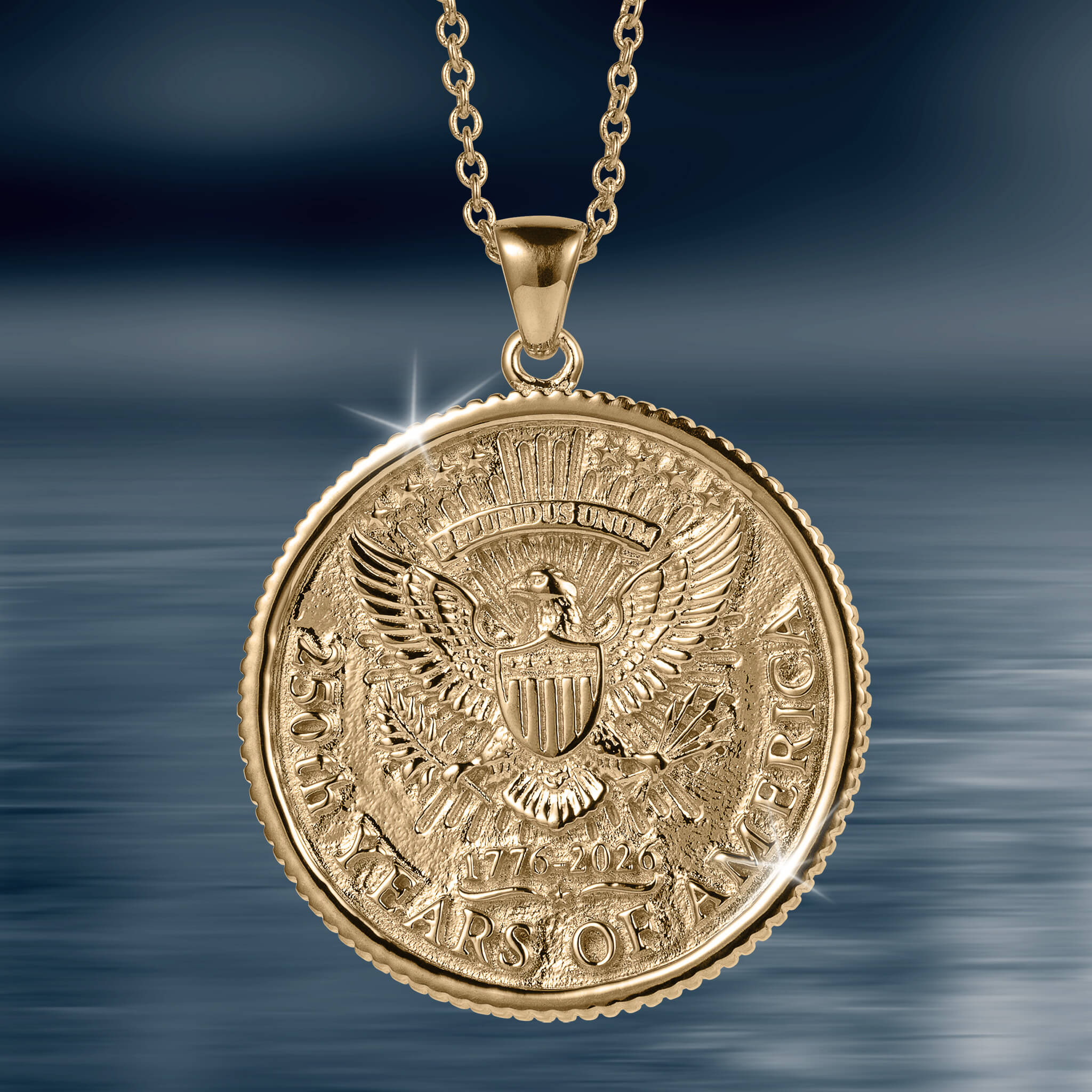Gold pendant necklace featuring a detailed eagle emblem and inscriptions commemorating 250 years of America, elegantly styled from the American Glory Collection.