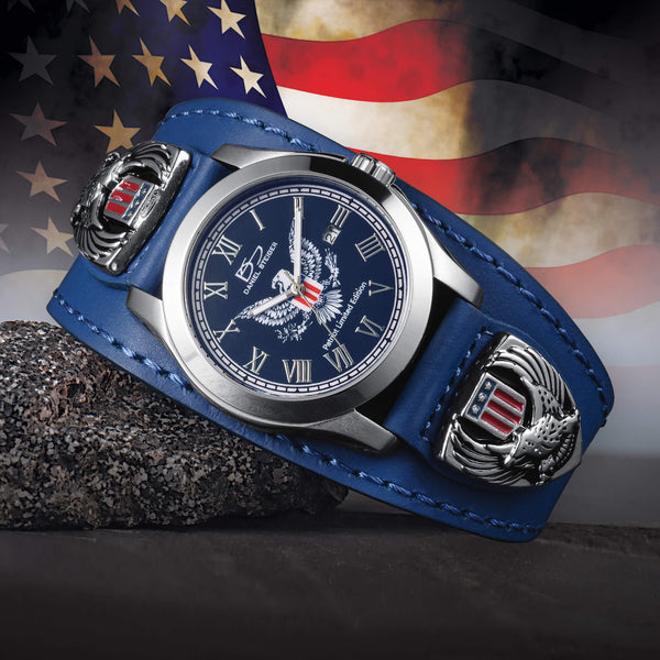 Wristwatch with blue leather strap and American flag design against an American flag background