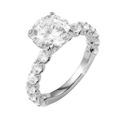 Grandeur Radiance Ring with a large cushion cut center stone and sparkling round accent stones on a polished silver tone band Up To 75% Off Retail
