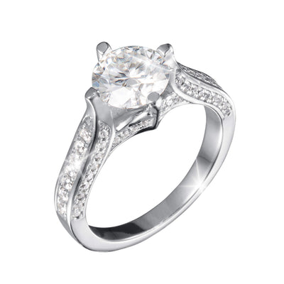 Novalyn Moissanite Ring featuring a large round center stone with a polished silver band adorned with smaller sparkling stones, a stunning jewelry piece.