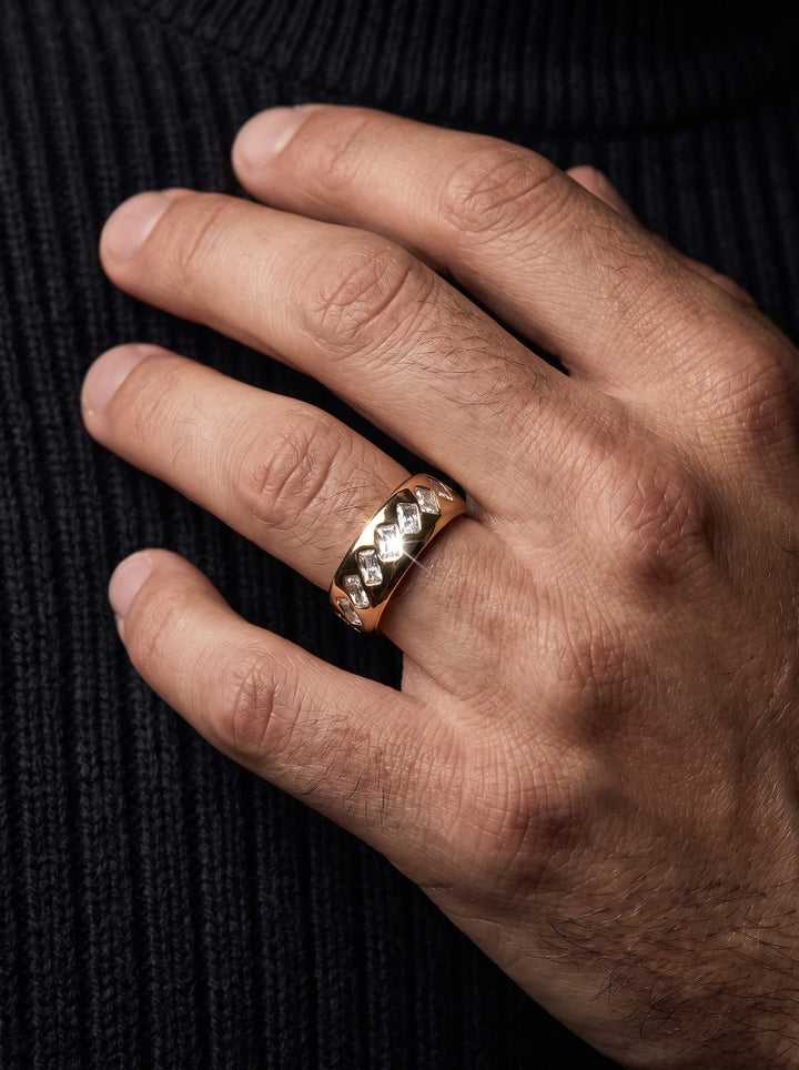 Tessera Men's Ring worn on a hand featuring a dark metal band with geometric silver and gold tone accents for a modern jewelry look