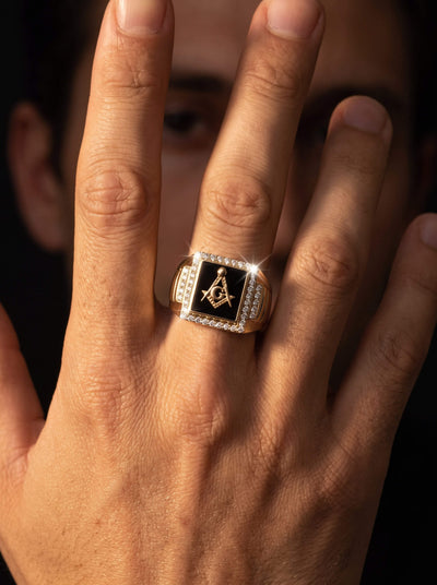 Keystone Men's Ring with black center, silver toned detailing, and star emblem worn on a hand. Up To 75% Off Retail.