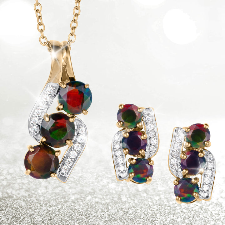 Ember & Eclipse Opal Ladies Collection featuring a gold tone pendant necklace and matching earrings with vivid opal gemstones and sparkling accents Up To 75% Off Retail