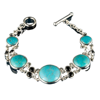 Turquoise and Onyx Bracelet featuring sterling silver chain links with round turquoise and black onyx stones, designed for female jewelry collectors and bracelet enthusiasts.