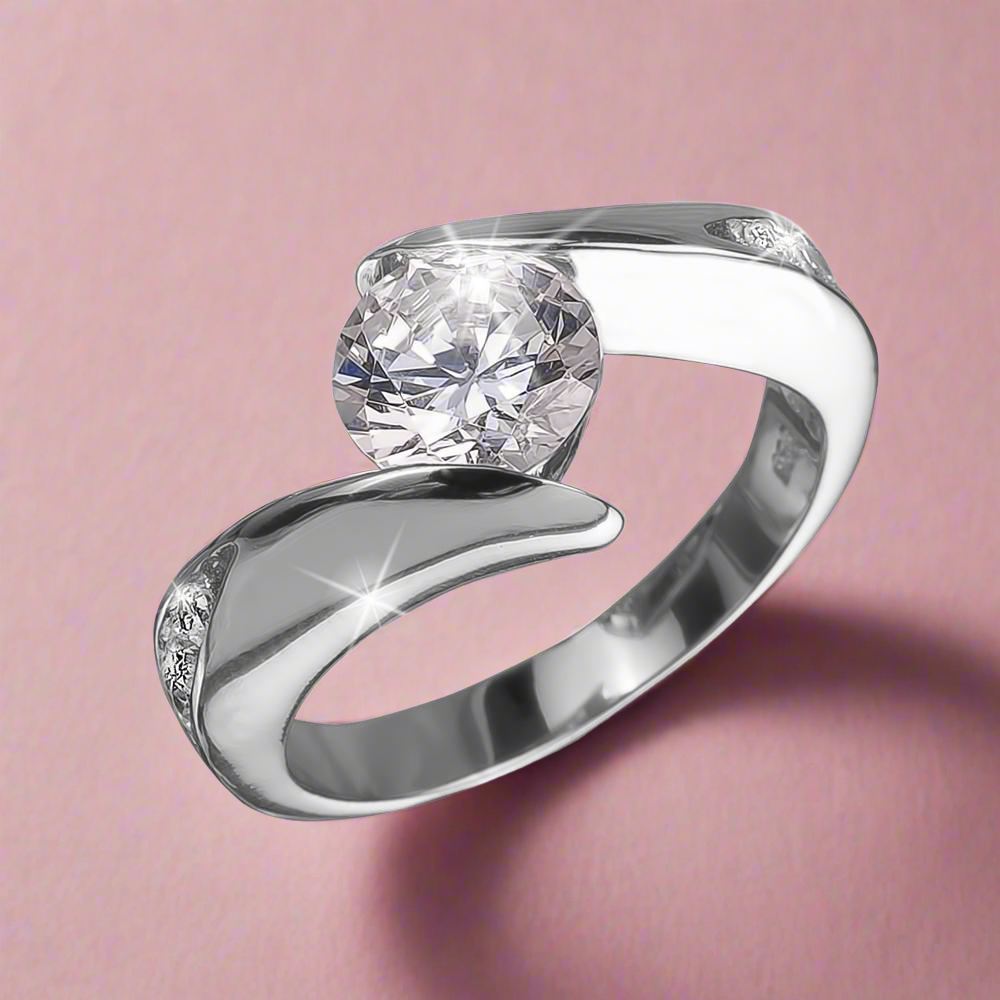 Elegant Viva Rhodium Rings featuring a sparkling centerpiece stone set in sterling silver with rhodium plating, designed for women’s fine jewelry collections.