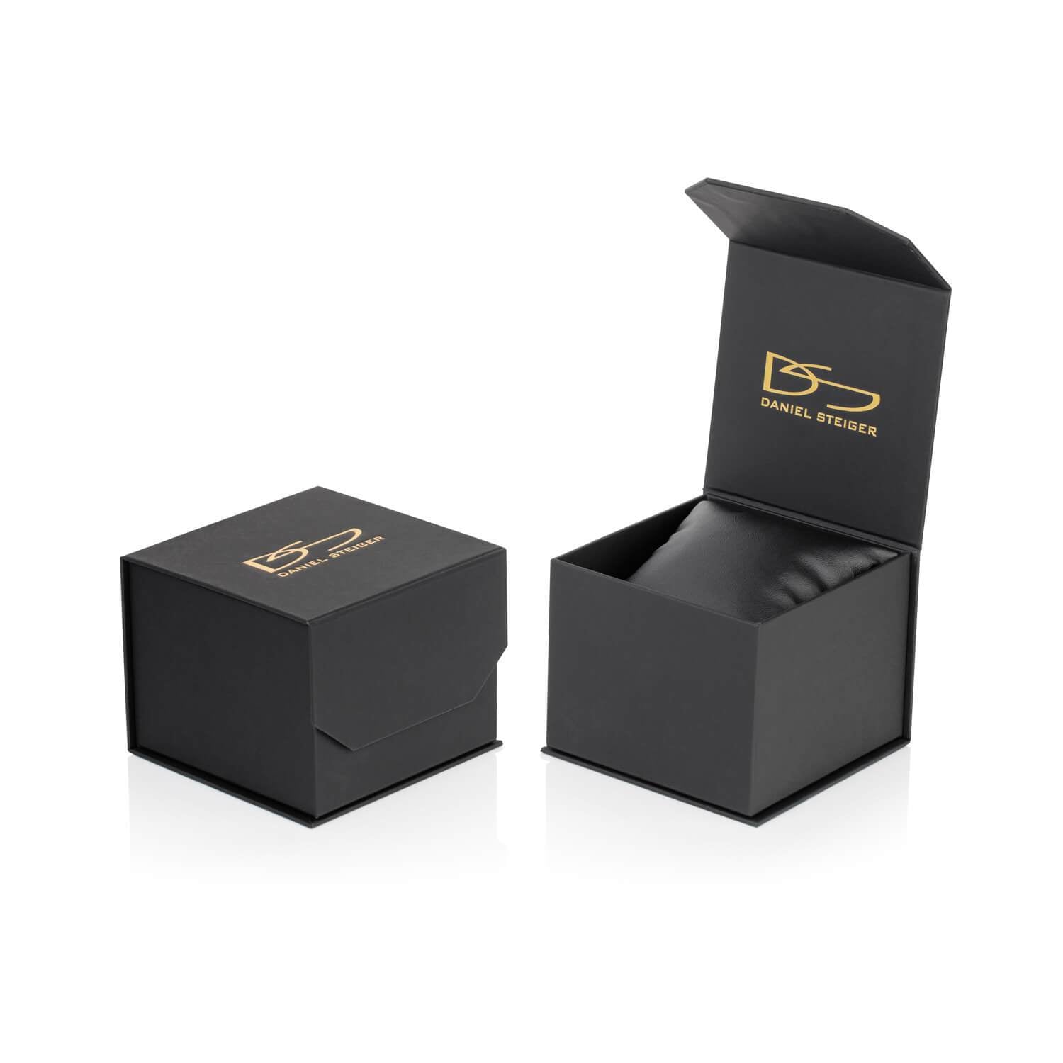 Black and gold Daniel Steiger branded watch box with cushion, designed for packaging the Patriot Men's Watch, ideal for presenting collectible timepieces.