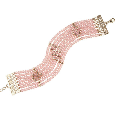Rosa Cascade Bracelet featuring multiple strands of pink gems with rose gold plating accents, designed as an elegant and feminine jewelry statement piece.