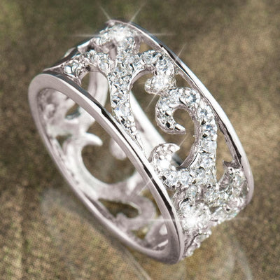 Scroll Ring crafted in sterling silver with rhodium plating, featuring an intricate openwork design and sparkling accents, designed for women’s jewelry collection.